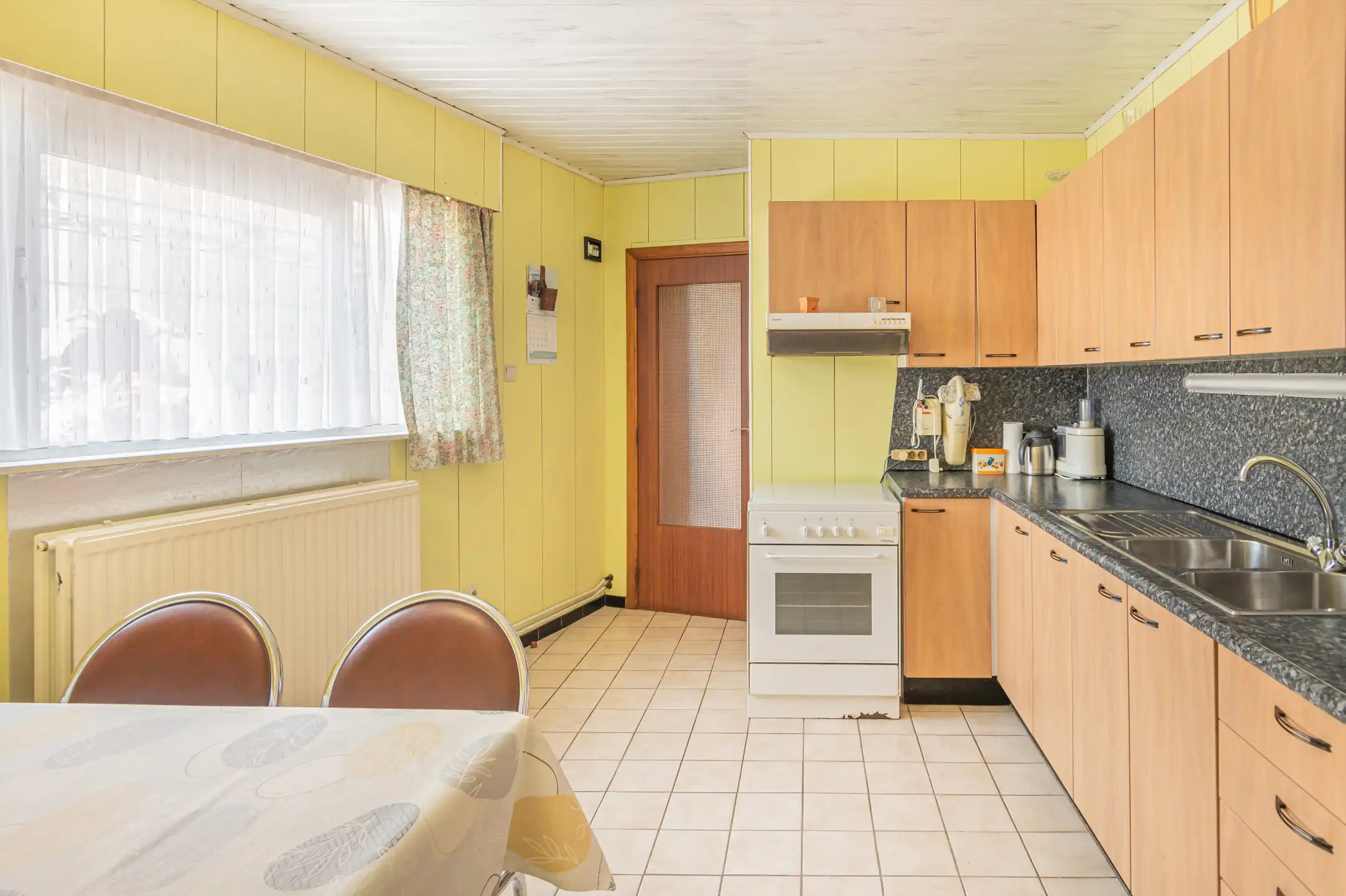 Te renoveren gezinswoning met garage in hartje Willebroek foto 2