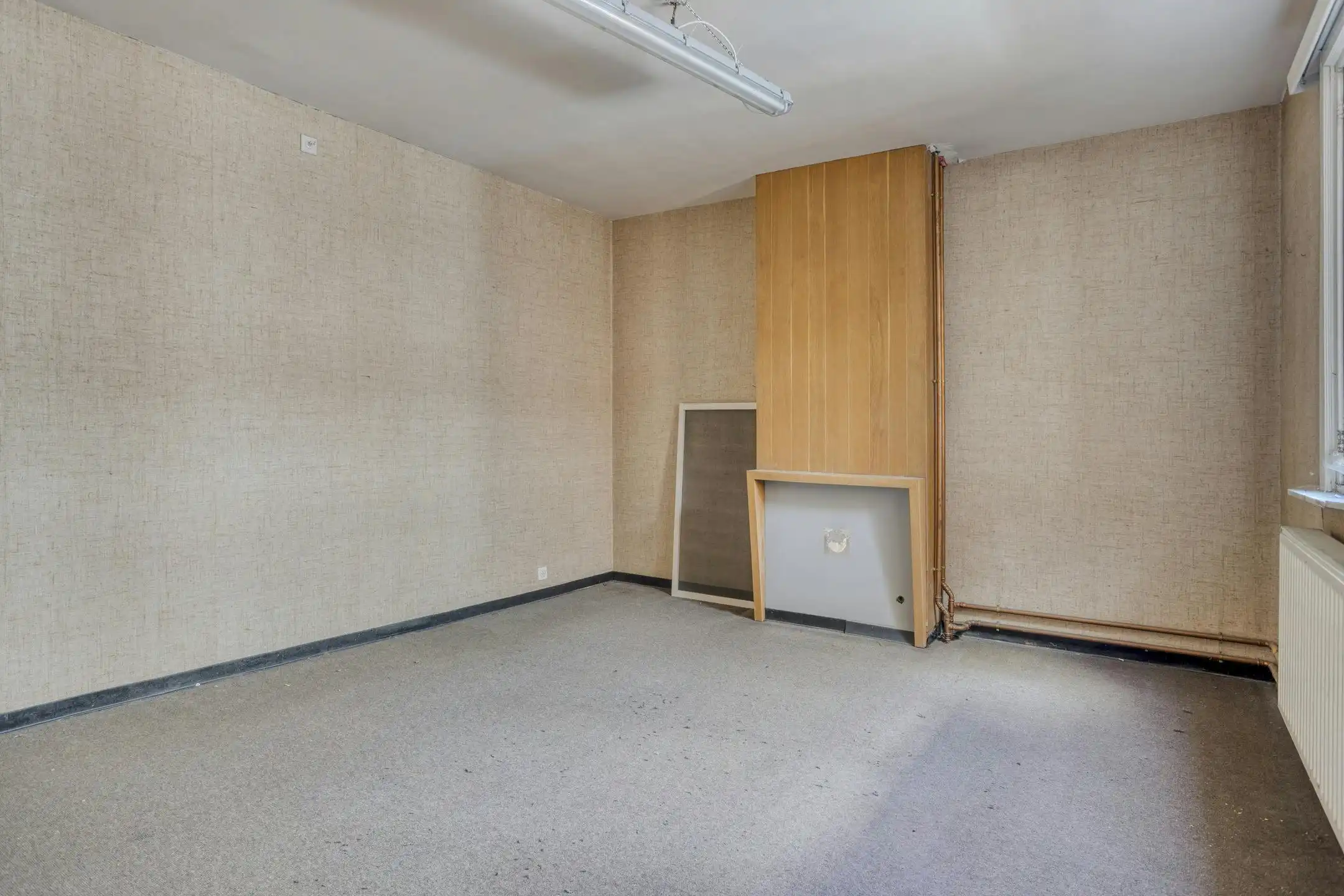 Te renoveren handelspand met woonst te koop in Roeselare foto 11