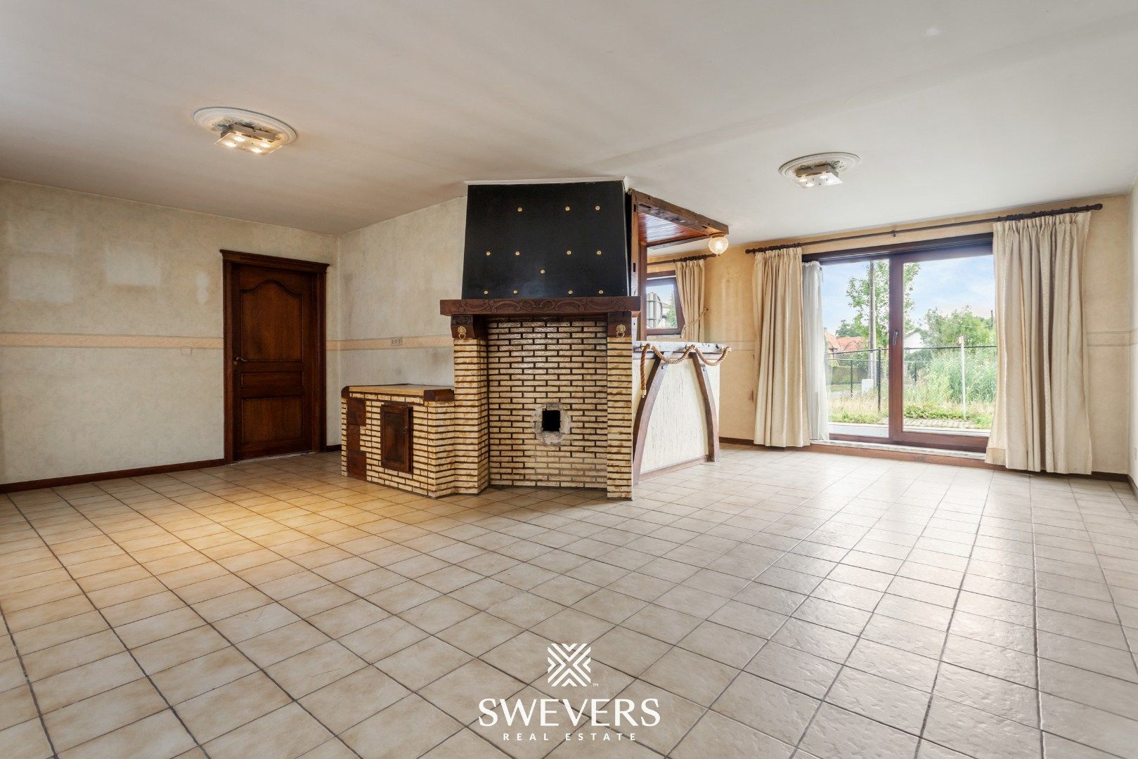 Te renoveren woning met veel potentieel op toplocatie te Diepenbeek foto 2