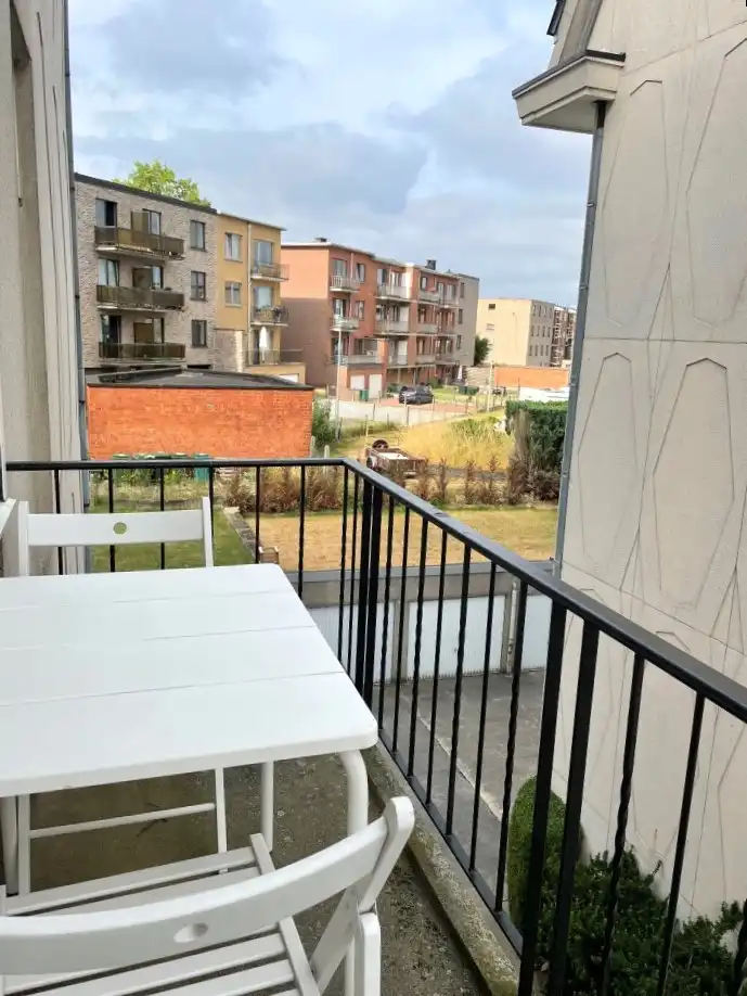 Lichtrijk - gerenoveerd hoekappartement MET garagebox foto 10
