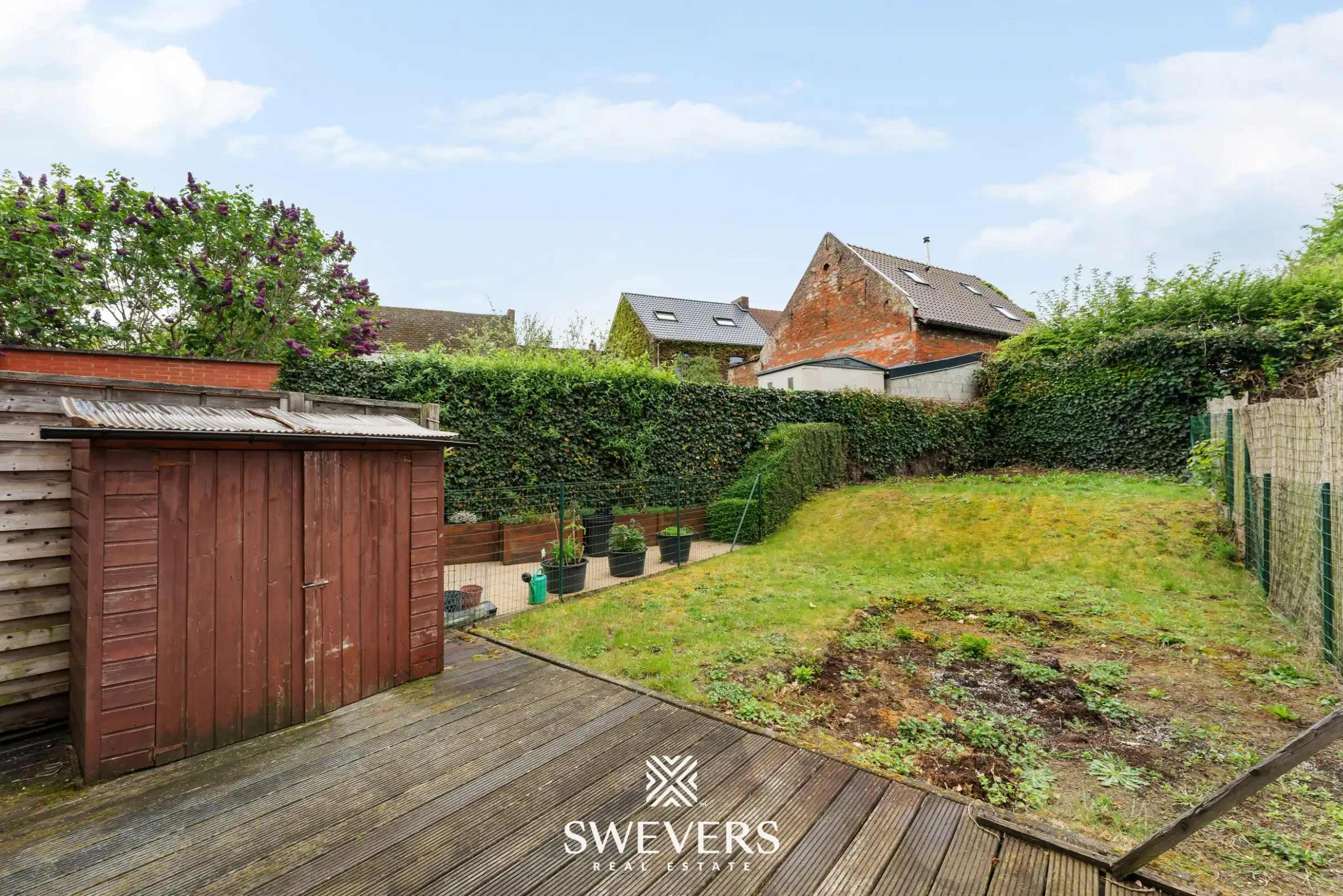 Ruim duplex appartement met 2 slaapkamers en tuin foto 19