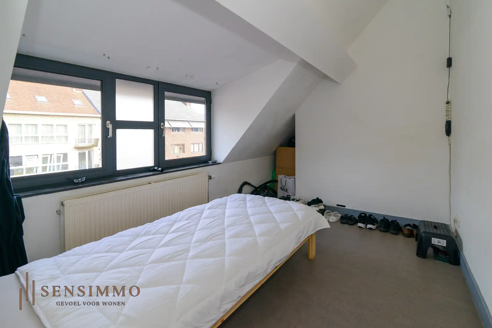 Commerciële handelspand met bovenliggend appartement in hartje Maasmechelen foto 7
