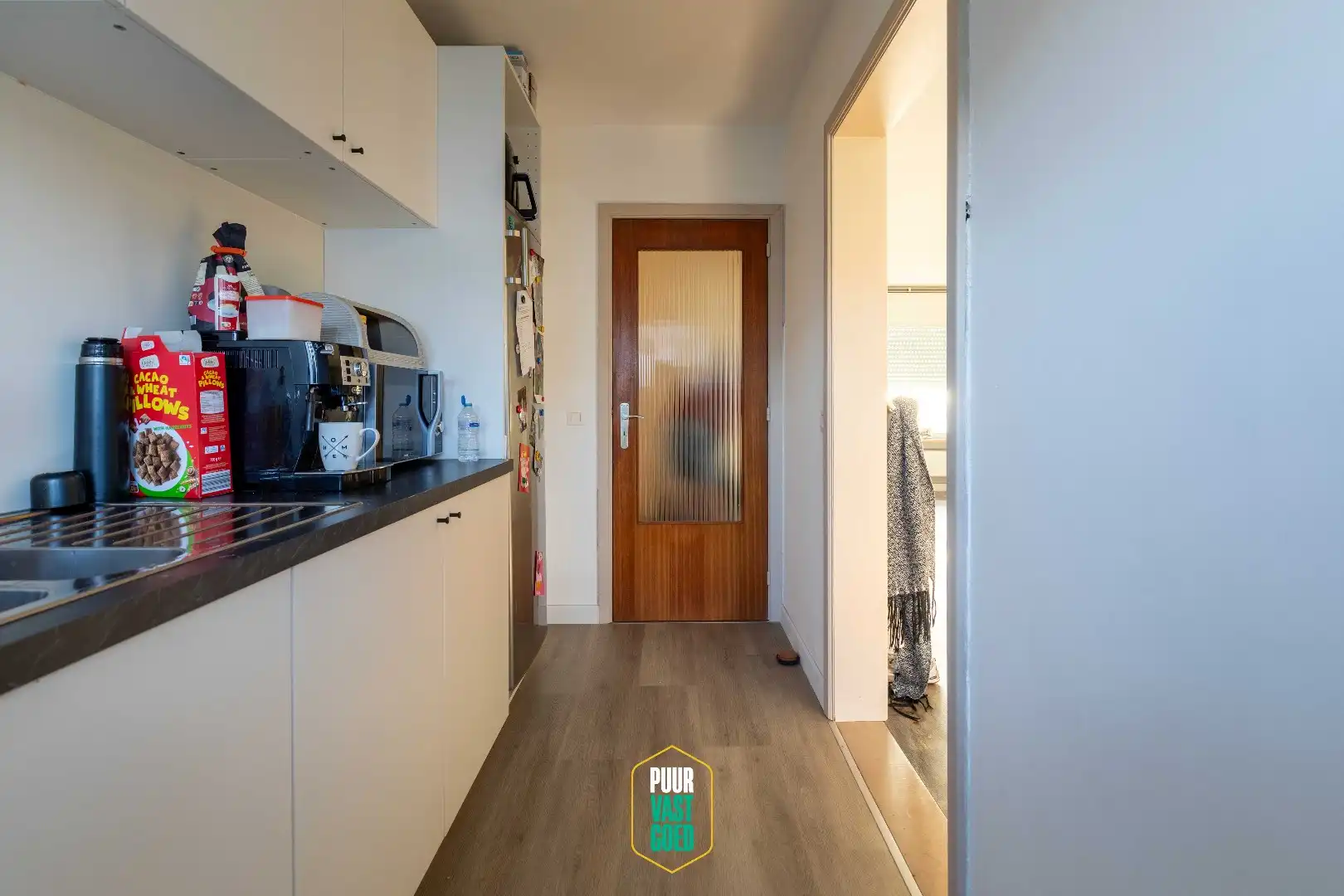 Ruim en verzorgd gelijkvloers appartement met terras foto 5