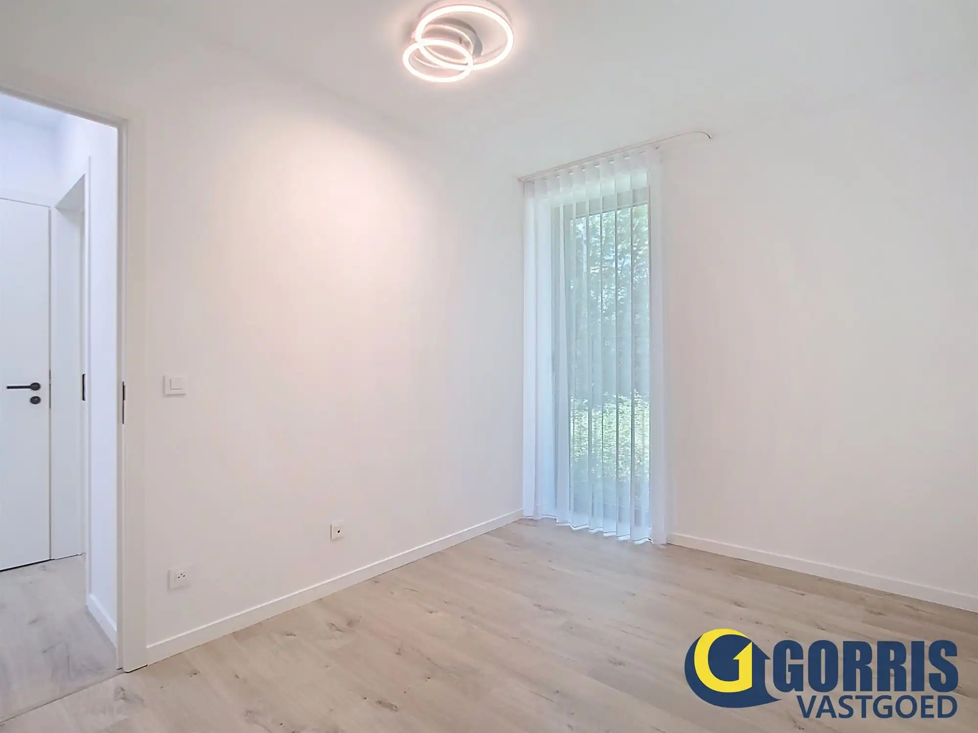 Rustig gelegen gelijkvloers nieuwbouwappartement met 2 slaapkamers. foto 9