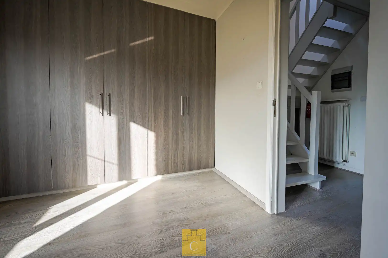 Instapklare trapgevelwoning met zonnig terrastuintje en grote berging, centrum, rustige straat omgeving ’t Zand foto 16