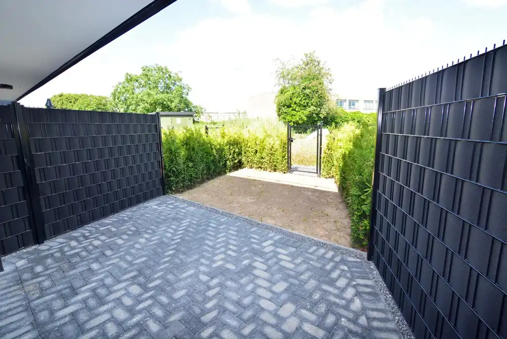 Gelijkvloers nieuwbouwappartement 124 m² met 2 slpk, tuintje en 2 autostandplaatsen. foto 3