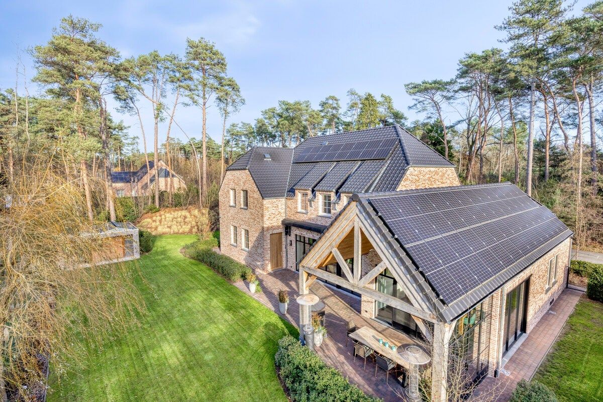 Ruim ingedeelde en kwalitatief afgewerkte villa op een mooi perceel met naastgelegen bouwgrond. foto 37