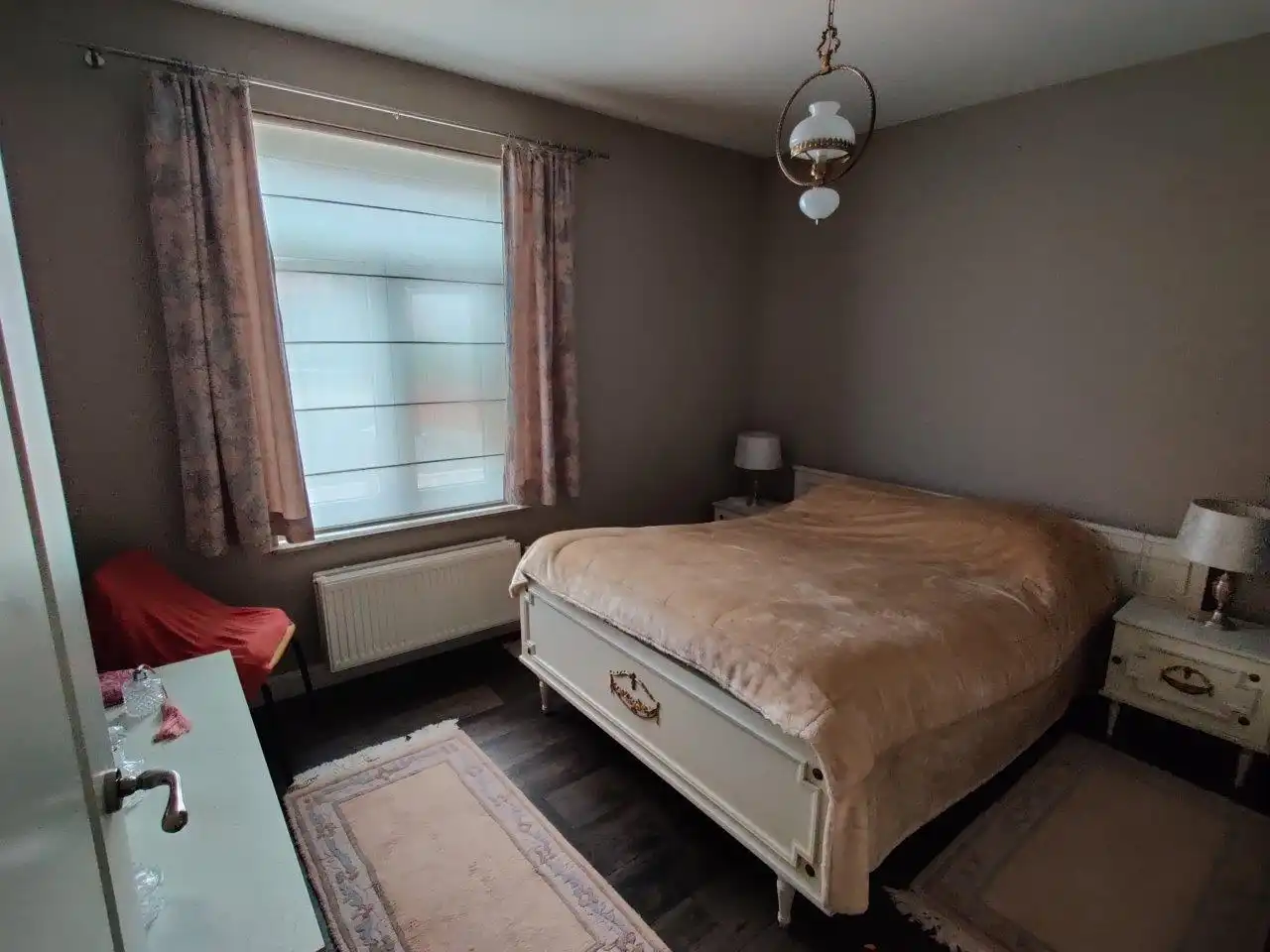 Ruim gelijkvloersappartement met 2 slaapkamers foto 12