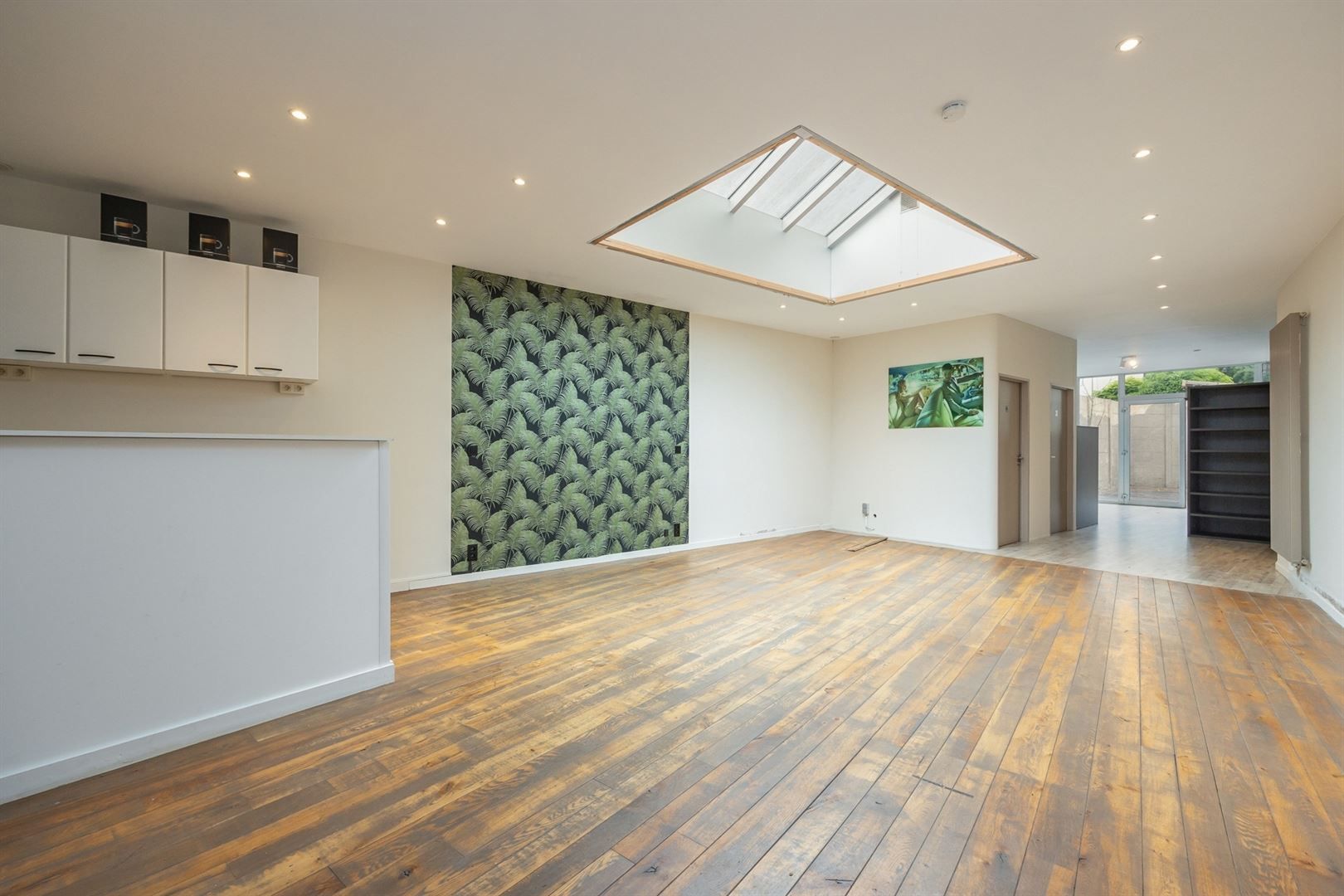 Handelshuis met ruime winkel en duplex appartement in dorp 's Gravenwezel foto 3