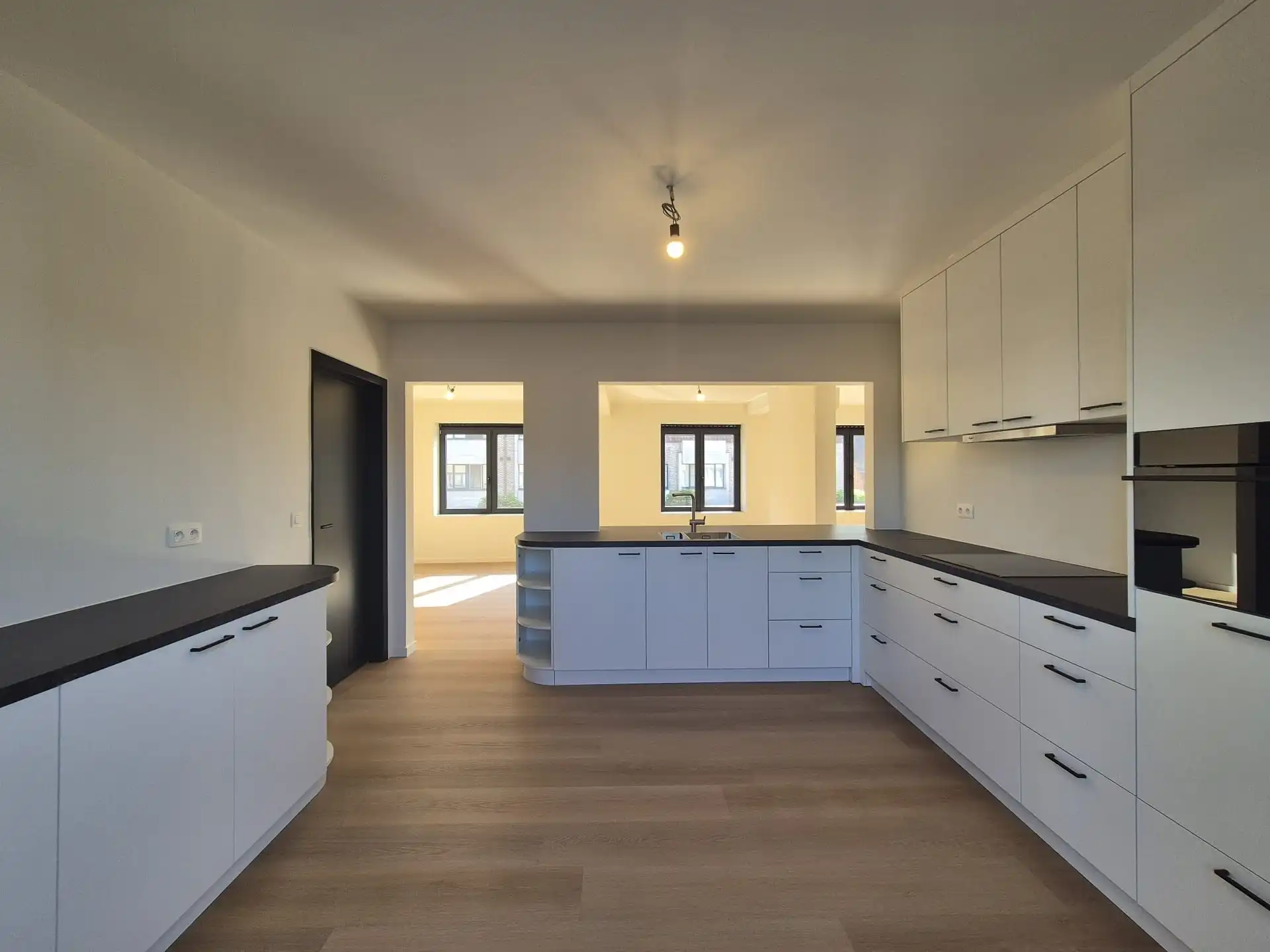 Ruim triplex appartement met polyvalente ruimte op toplocatie in het hart van Wetteren foto 10