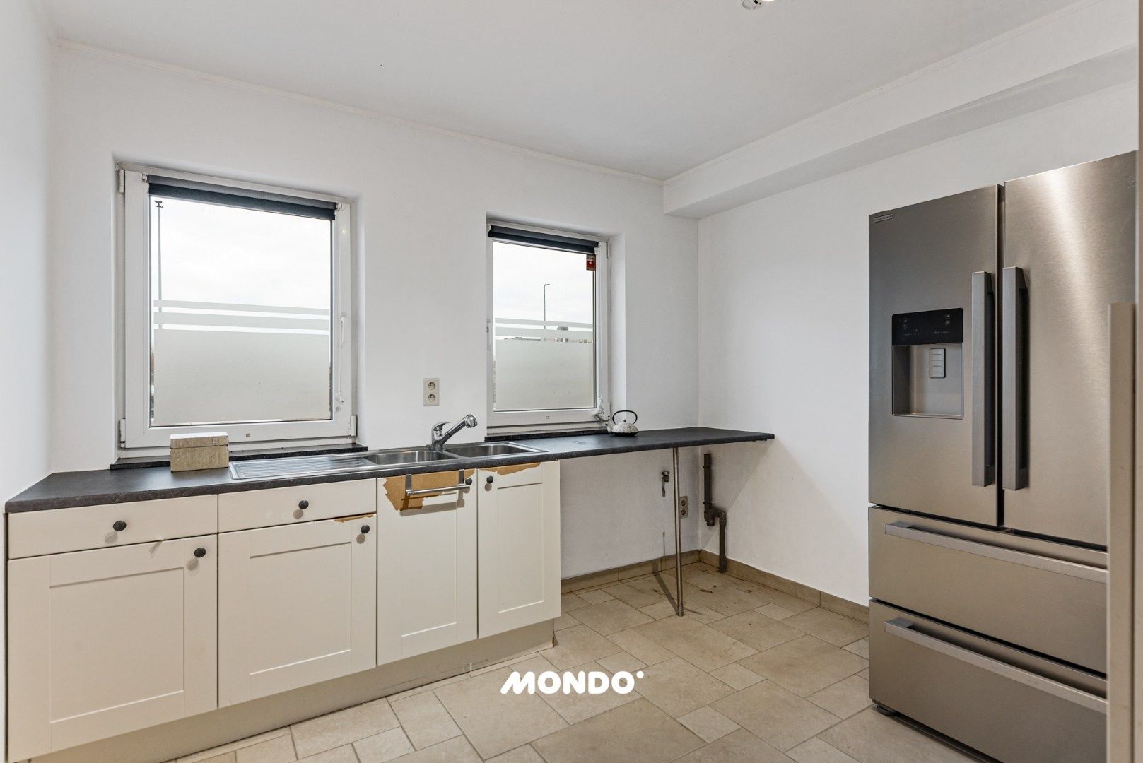 Gelijkvloers appartement met ruim terras en garage in Reet foto 8