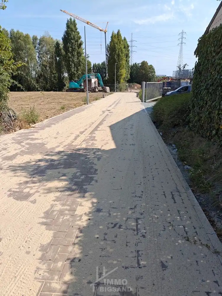Perceel bouwgrond halfopen bebouwing Pittem foto 7