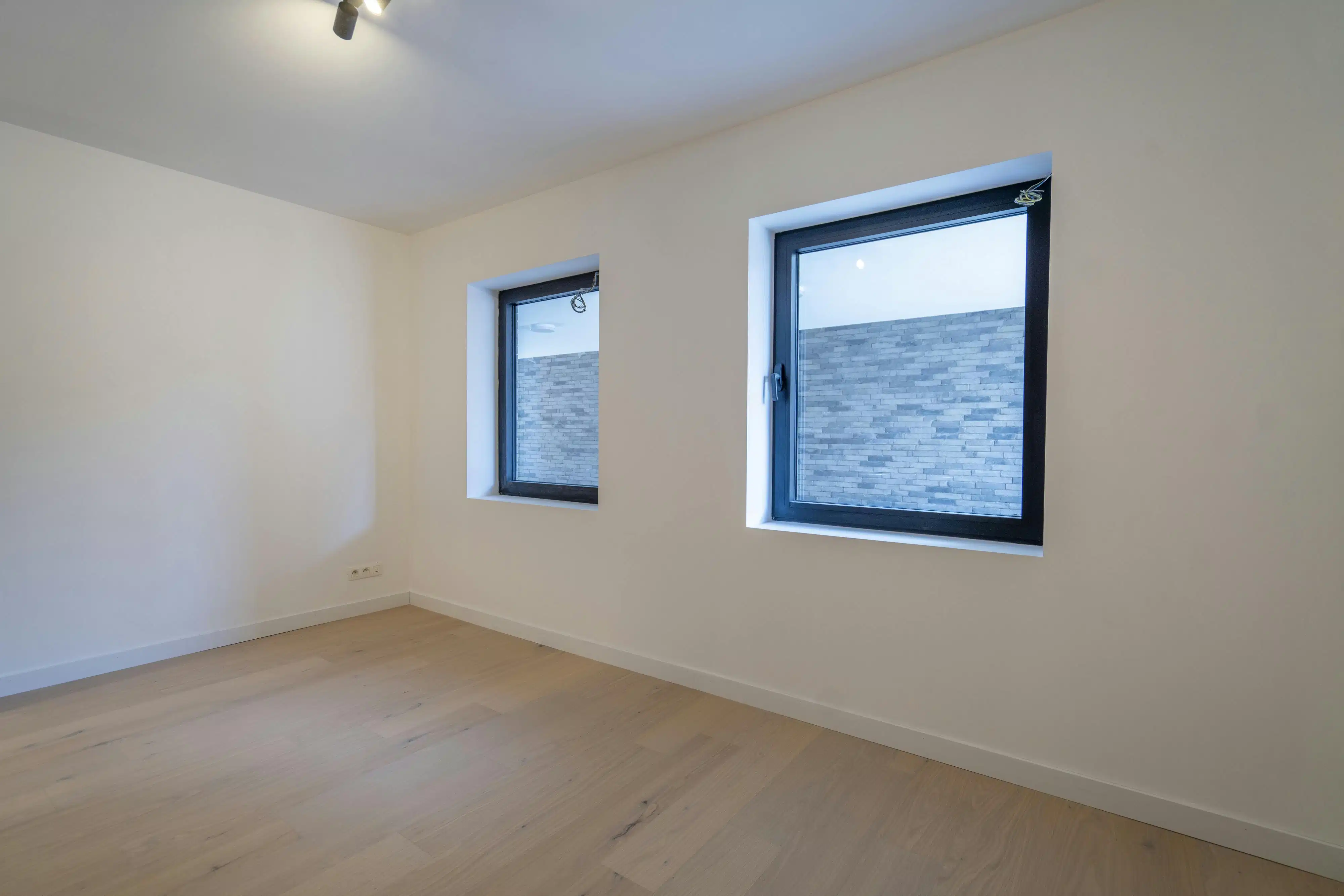 Nieuw en energiezuinig 2-slaapkamerappartement te koop te Wevelgem foto 11