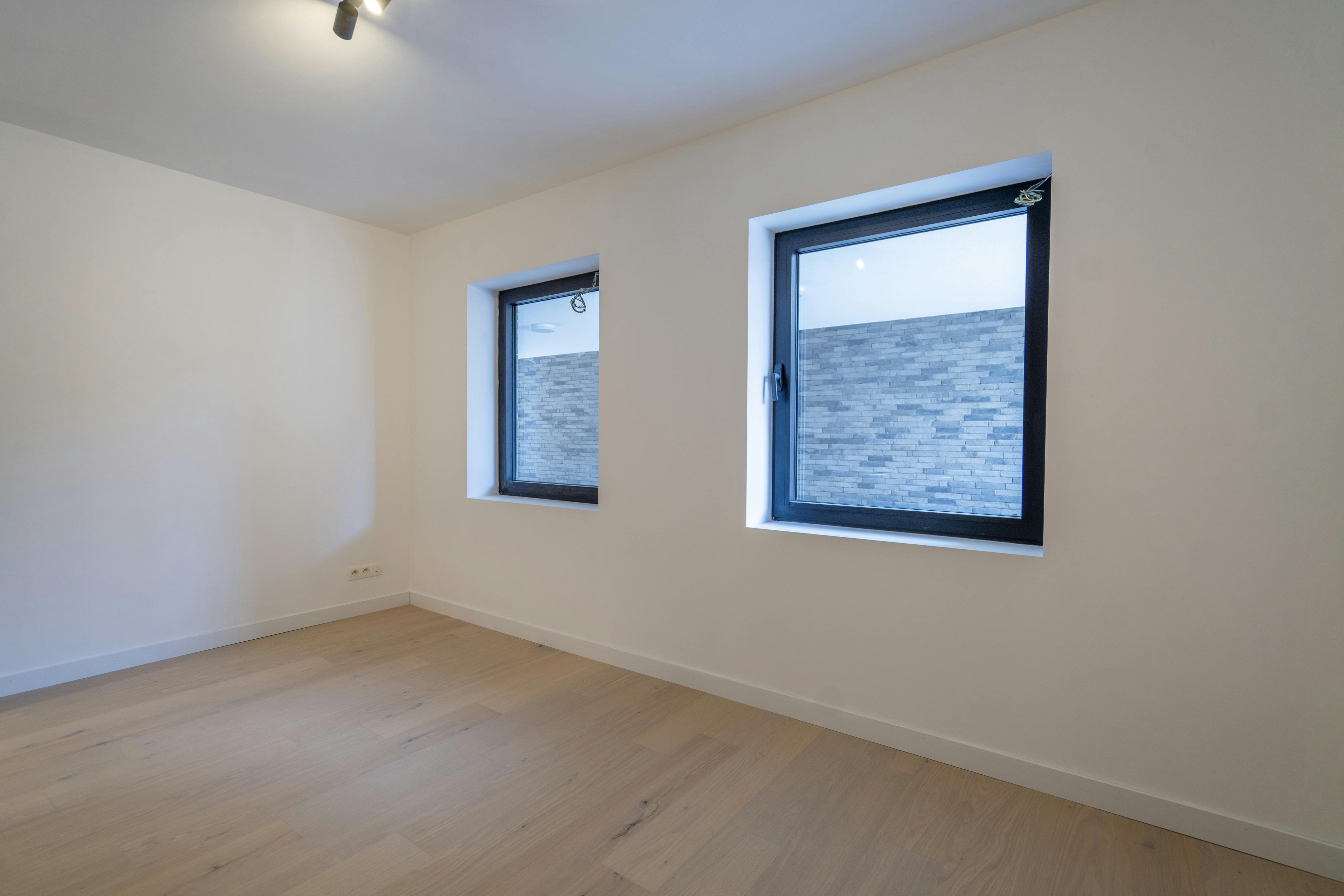 Nieuw en energiezuinig 2-slaapkamerappartement te koop te Wevelgem foto 11