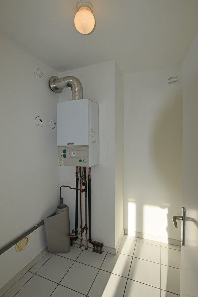 Verzorgd 2-slpk appartement met grote tuin te Borsbeek. foto 5