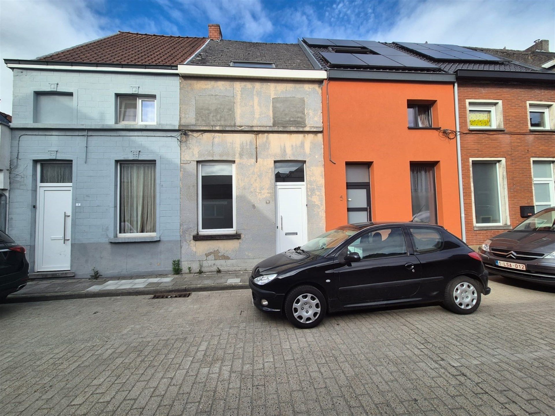Zeer gunstig gelegen starterswoning met 2 slaapkamers en tuin. foto {{pictureIndex}}