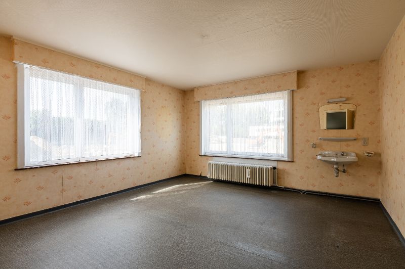 Zeer degelijke woning met veel potentieel foto 17