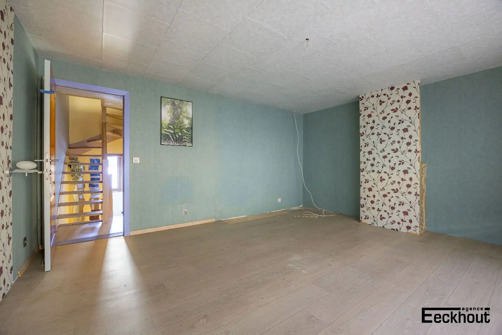 Te renoveren woning met diepe, zonnige tuin foto 11