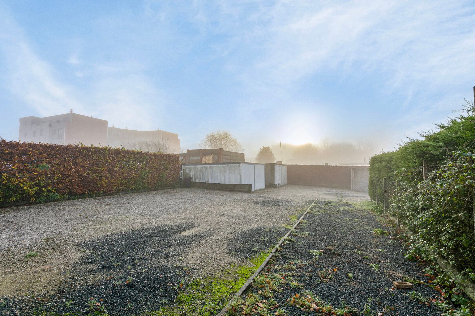 immo DAVID stelt voor: 5 garages en 4 staanplaatsen te Asse foto 3