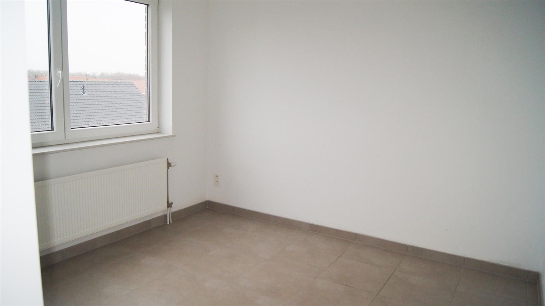 App. met 1 slpk, groot terras en garage foto 8