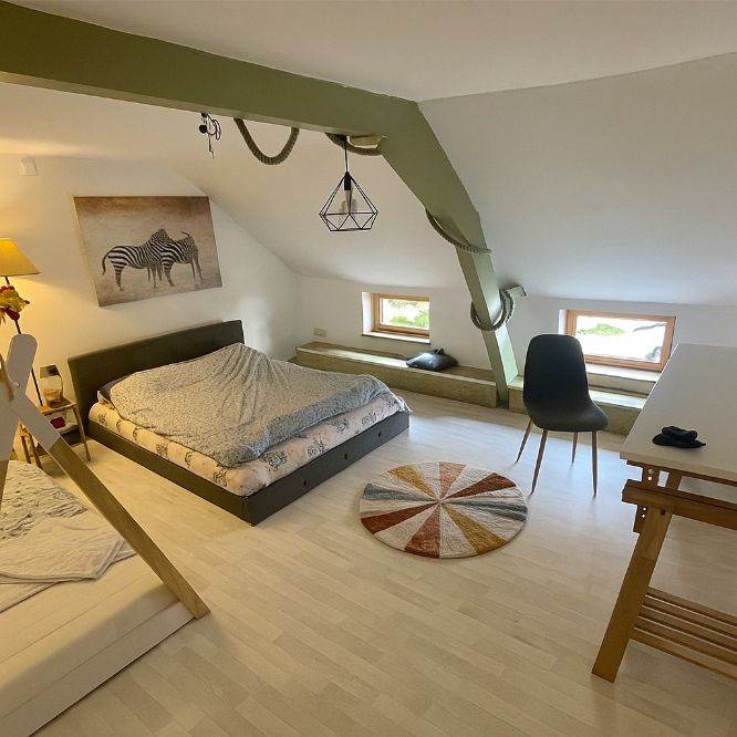 Instapklare rijwoning met charme en mooi rendement in hartje Ronse foto 10