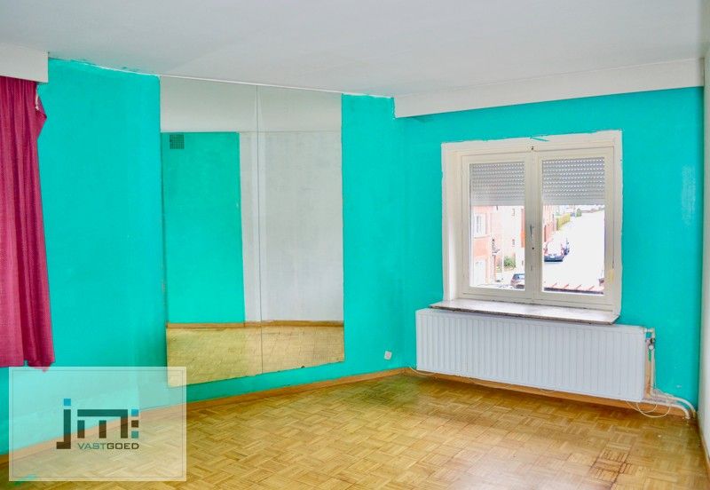 Handelspand met duplex-appartement in hartje Borgloon foto 13