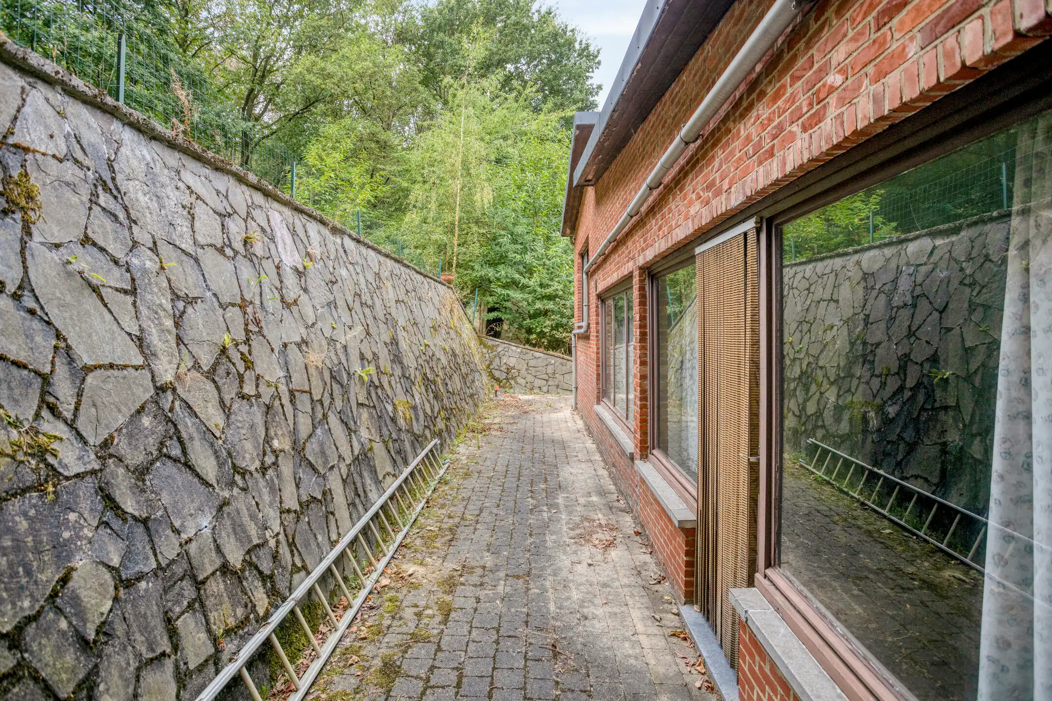 Woonst met mogelijkheden op een uniek perceel van 50 are foto 25
