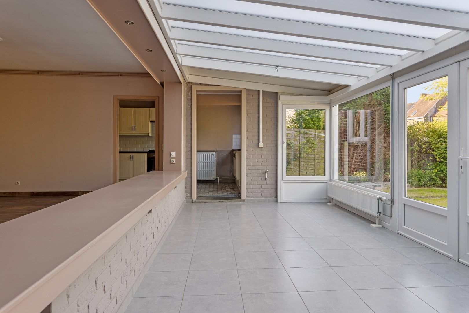 Woning met twee woonentiteiten, garage en tuin  foto 9