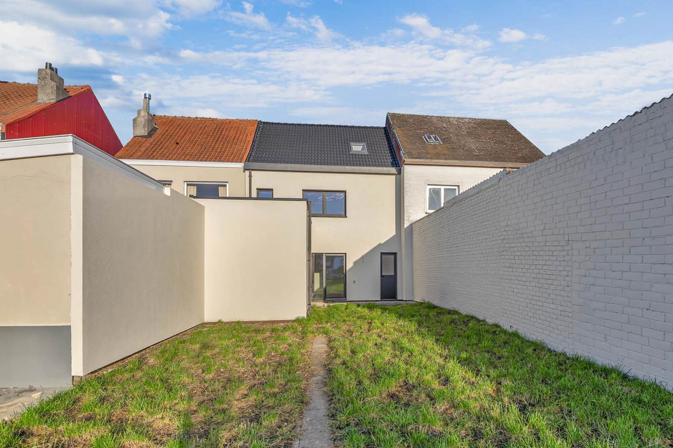 Volledig gerenoveerde woning met 4 slpks en tuin foto 28