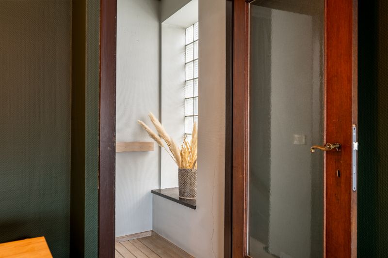 Commercieel handelspand met bovenliggende woonst op de Markt van Ingelmunster foto 12