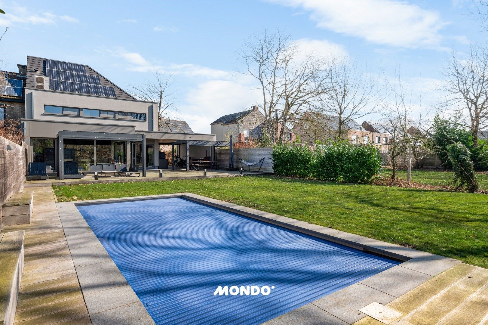 Energiezuinige villa met 6 slaapkamers, zwembad en domotica in het groene Blaasveld foto 4