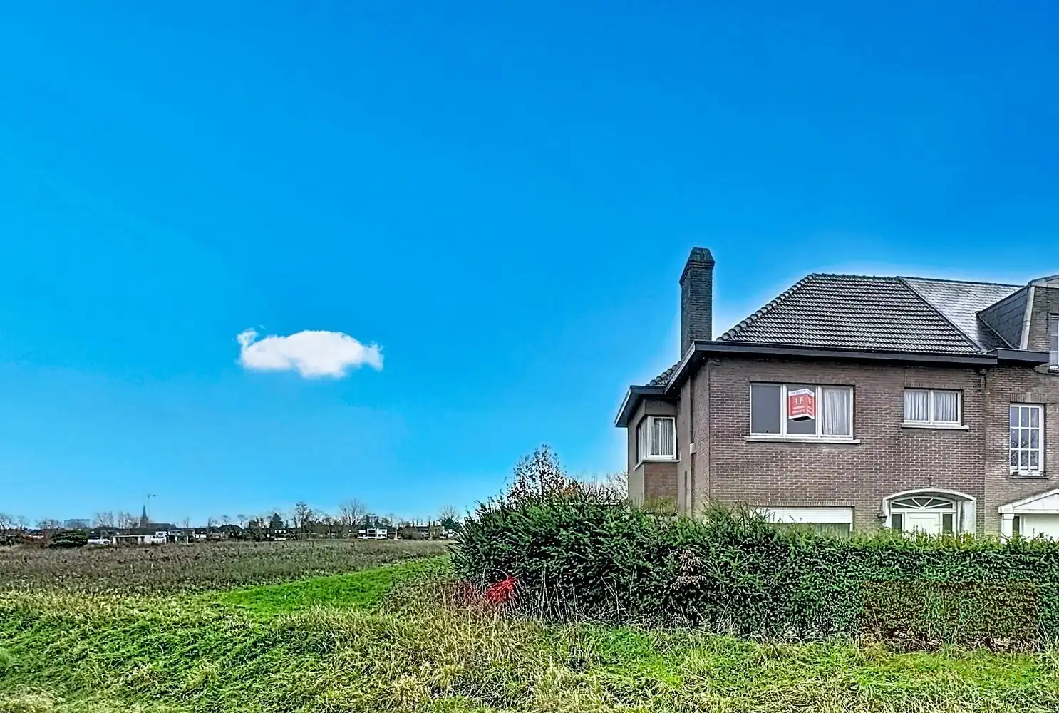 Karaktervolle halfopen gezinswoning aan de stadsrand van Aalst foto 3