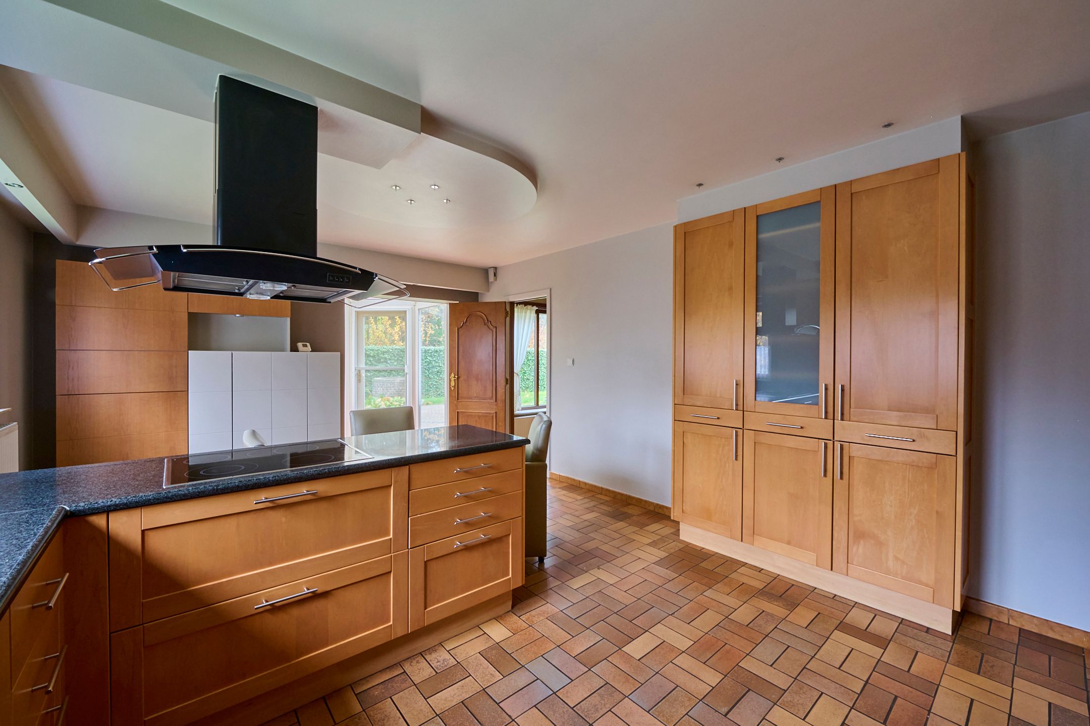Zeer ruime gezinswoning + bovenliggend appartement foto 6