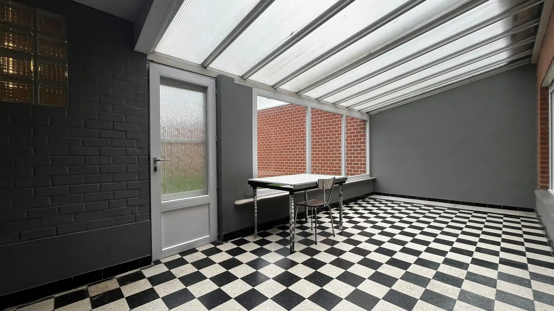 Grote woning met mogelijks vier kamers, garage en ruime tuin foto 7