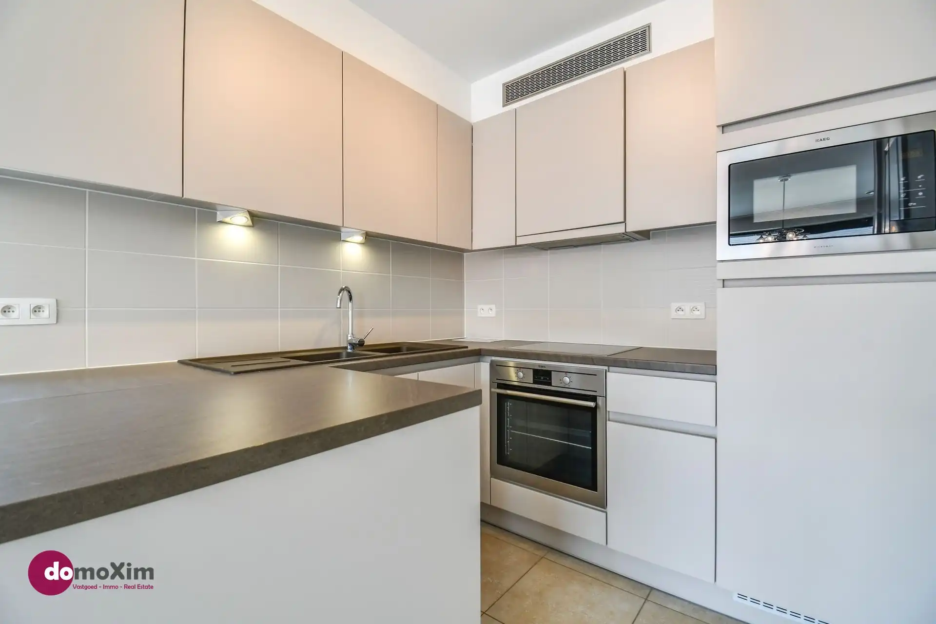 Instapklaar 3-slaapkamer appartement met parking in hartje Boortmeerbeek foto 10
