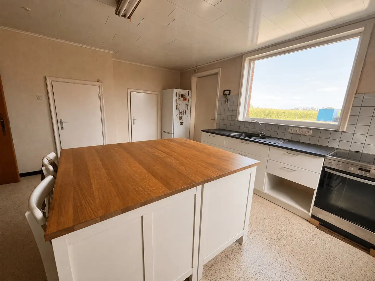 Ruim perceel (2028 m2)met renovatiepand en vergunde loods in Ingelmunster foto 9