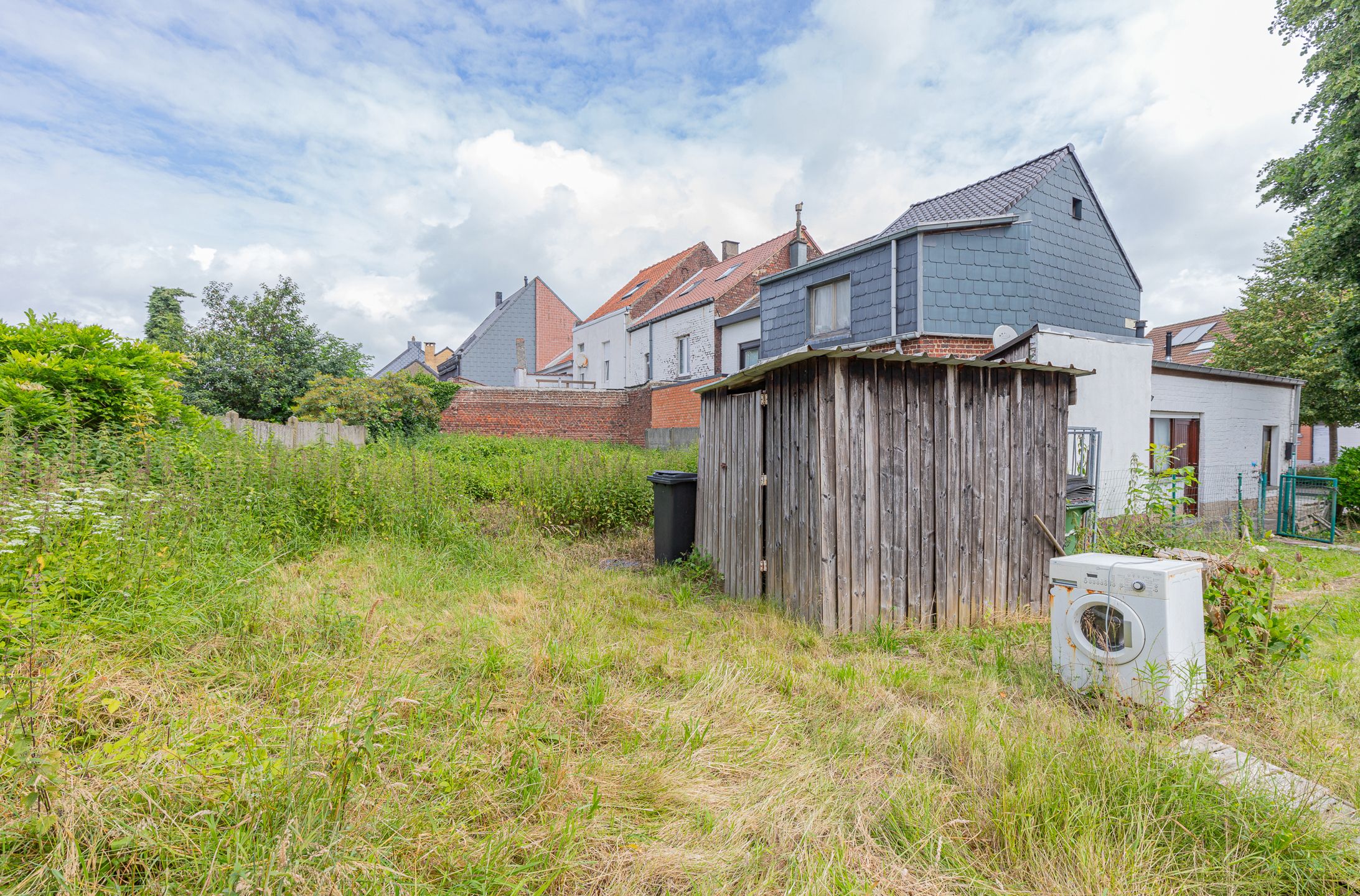 DENDERLEEUW - Halfopen woning met ruime tuin nabij station foto 16