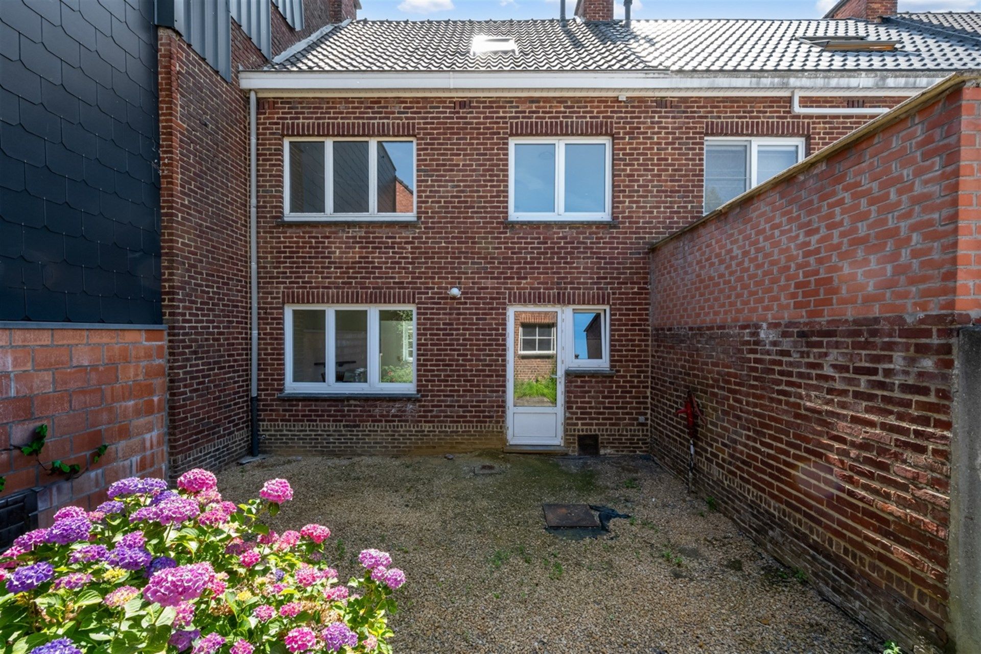 Ruime stadswoning met drie slaapkamers en tuin in centrum Aalst foto 14
