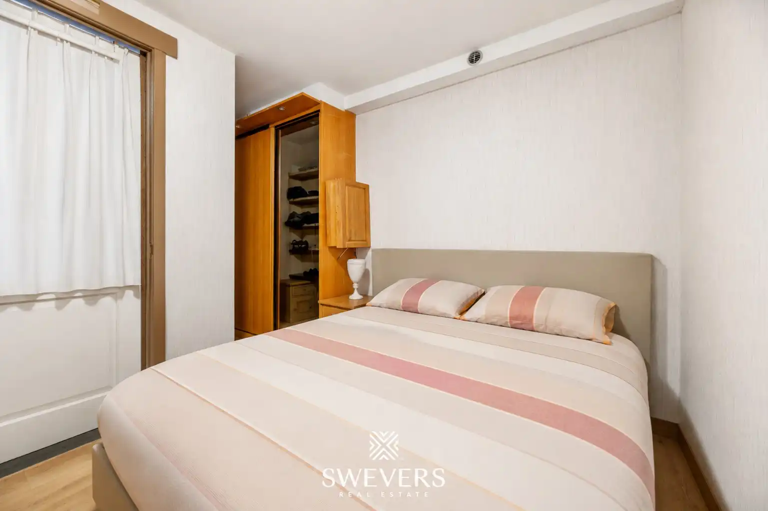 Ruim gelijkvloers appartement met twee slaapkamers foto 11