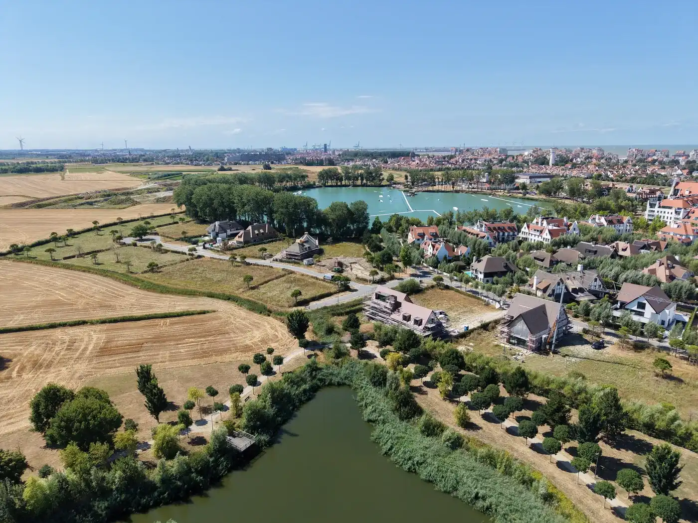 GOLFLOT:   bouwperceel met open zicht rechtstreeks op toekomstige golf van Duinenwater.  foto 6