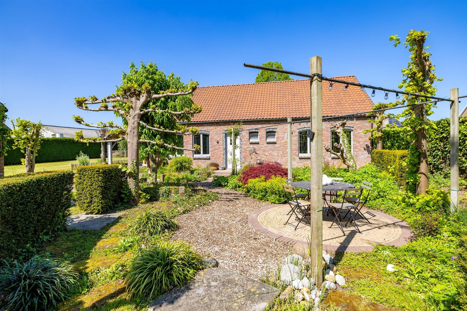 Karaktervolle open bebouwing met loods op groot perceel foto 37