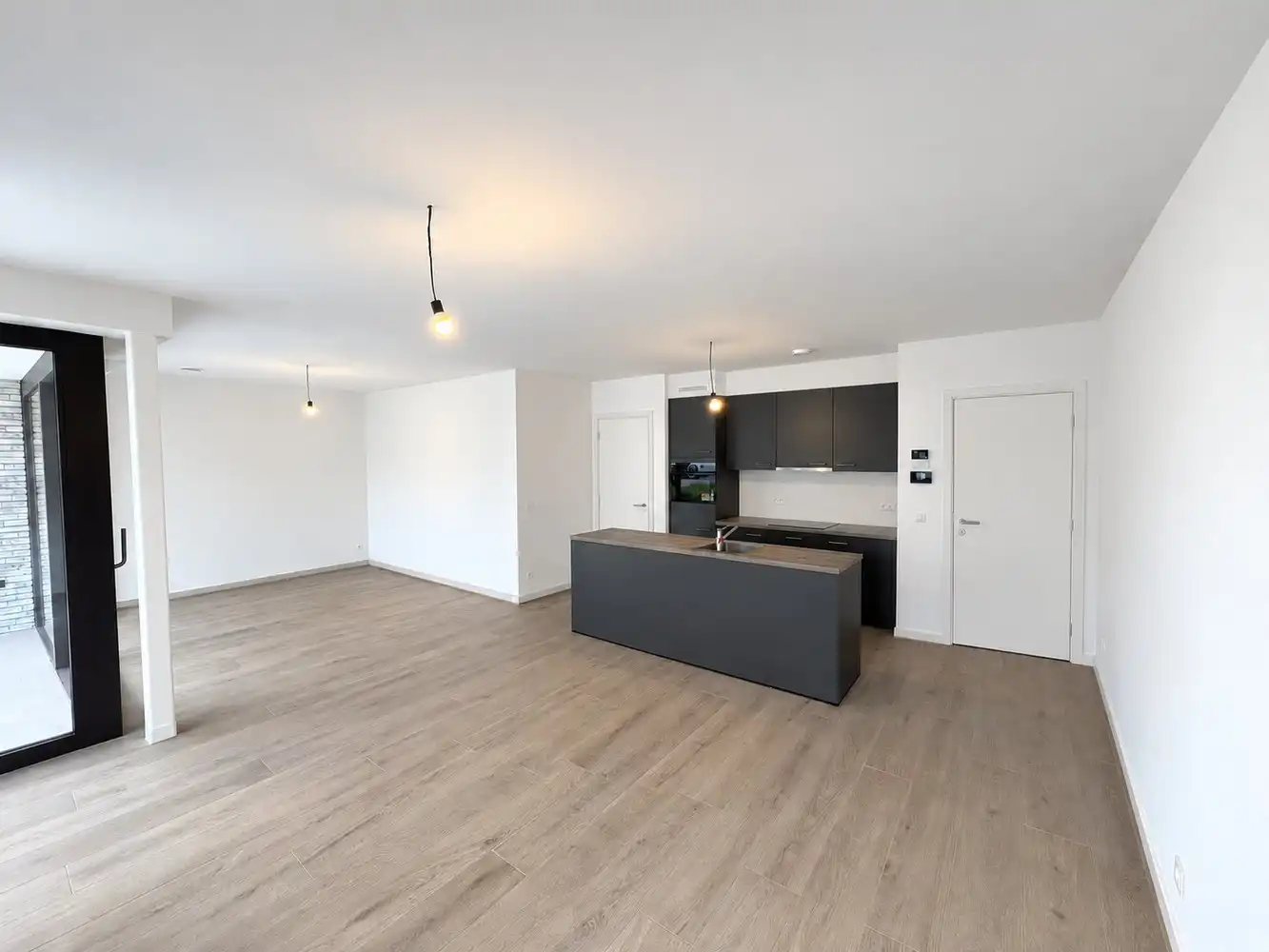 Gelijkvloers appartement met 2 slaapkamers in het centrum van Zonhoven foto 3