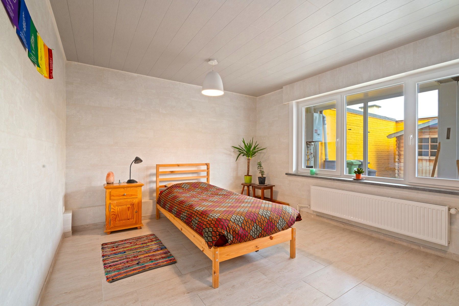 Ruim gelijkvloers appartement met tuin en garage foto 14