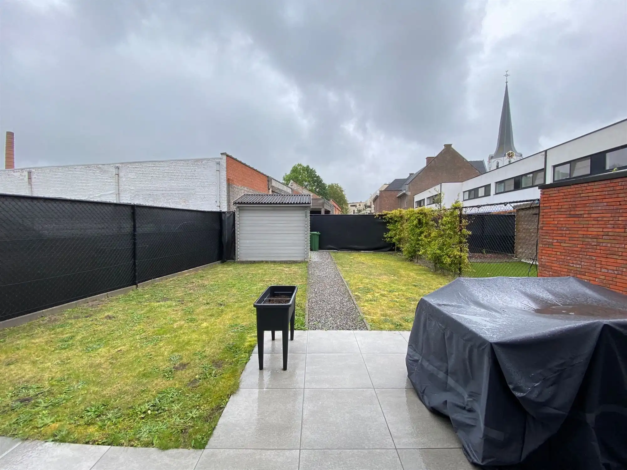 Knap en energiezuinig gelijkvloers appartement met 2-slpk, aangename tuin en een autostaanplaats foto 7