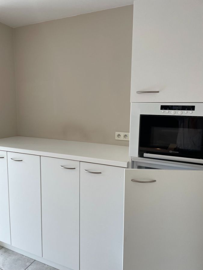 ruim instapklaar twee slaapkamer appartement met groot zongericht terras & gelijkvloerse garage foto 16