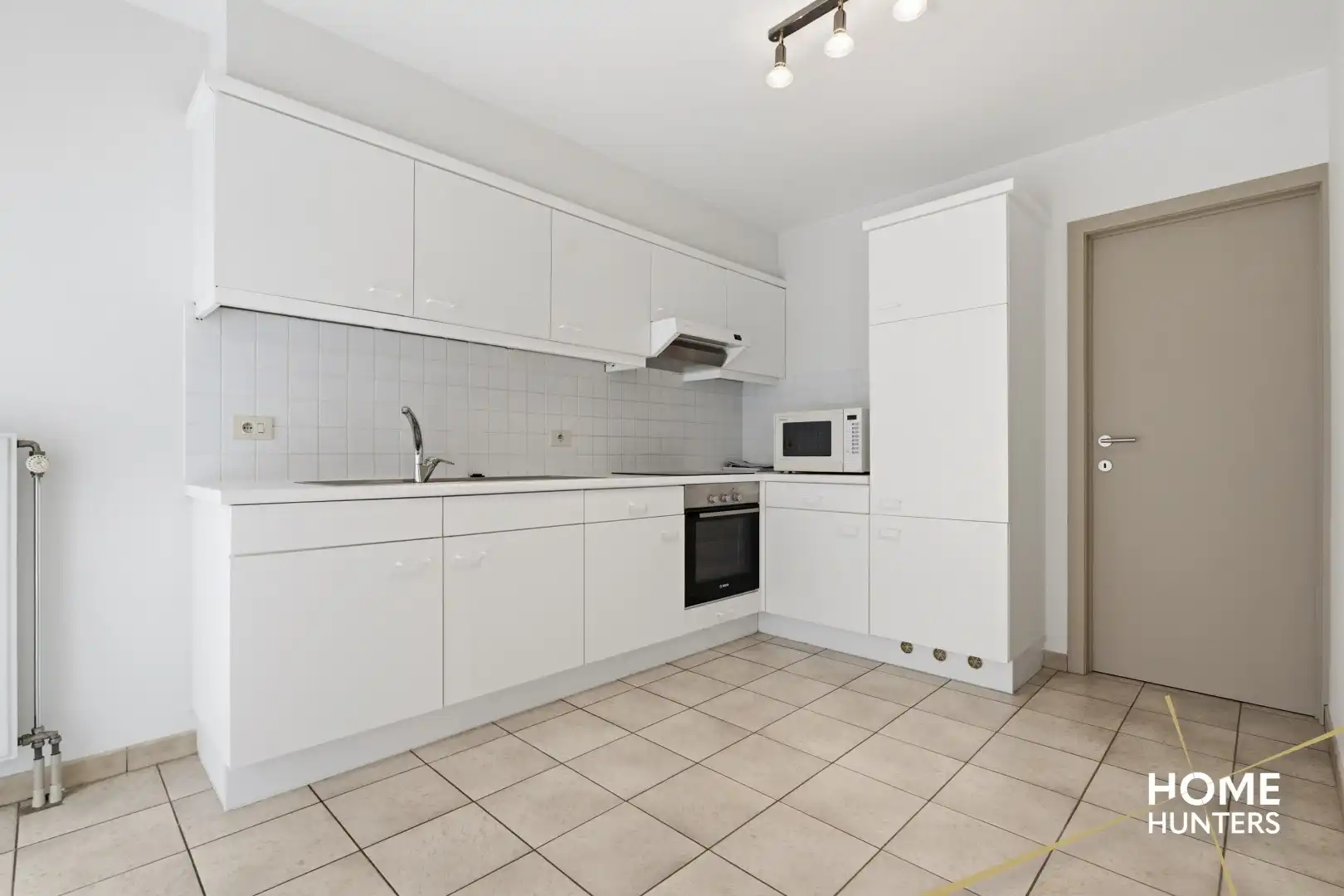 Lichtrijk gelijkvloers appartement in centrum Roeselare foto 7