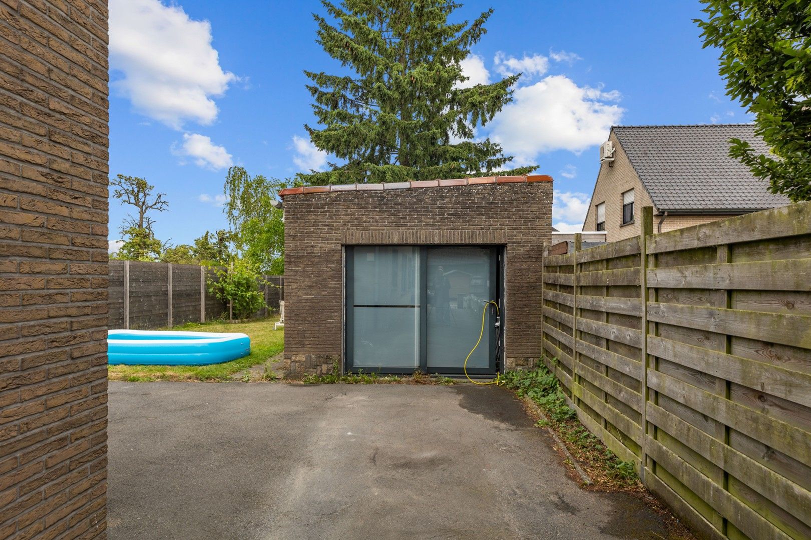 Halfopen gezinswoning in het hart van het landelijke Gontrode, met zicht op agrarisch gebied foto 20
