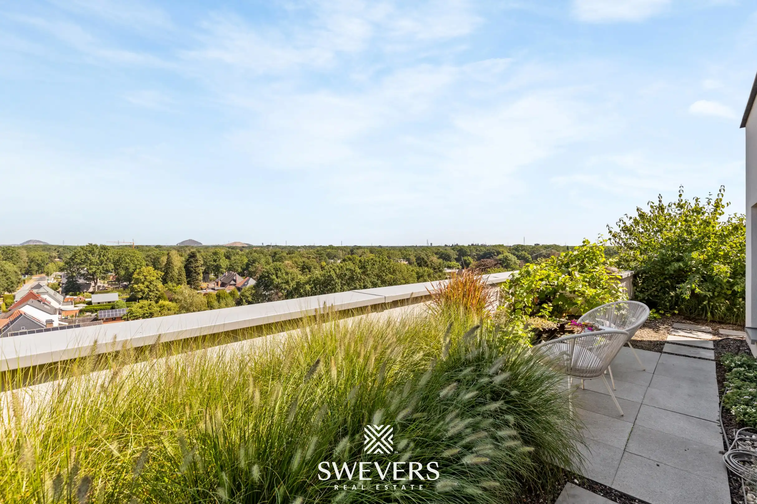 Exclusief penthouse met veel lichtinval en ruim panoramisch terras met prachtig ver uitzicht in centrum Genk foto 30