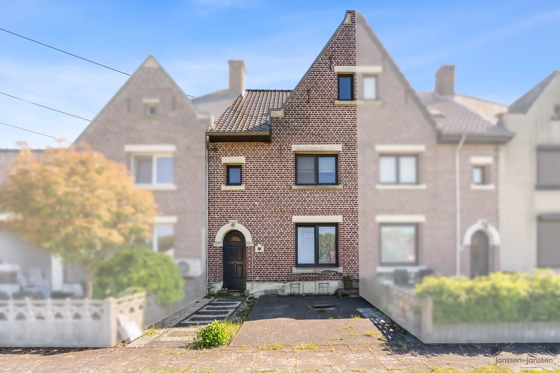 Charmante rijwoning met tuin in het groene Waterschei foto 2