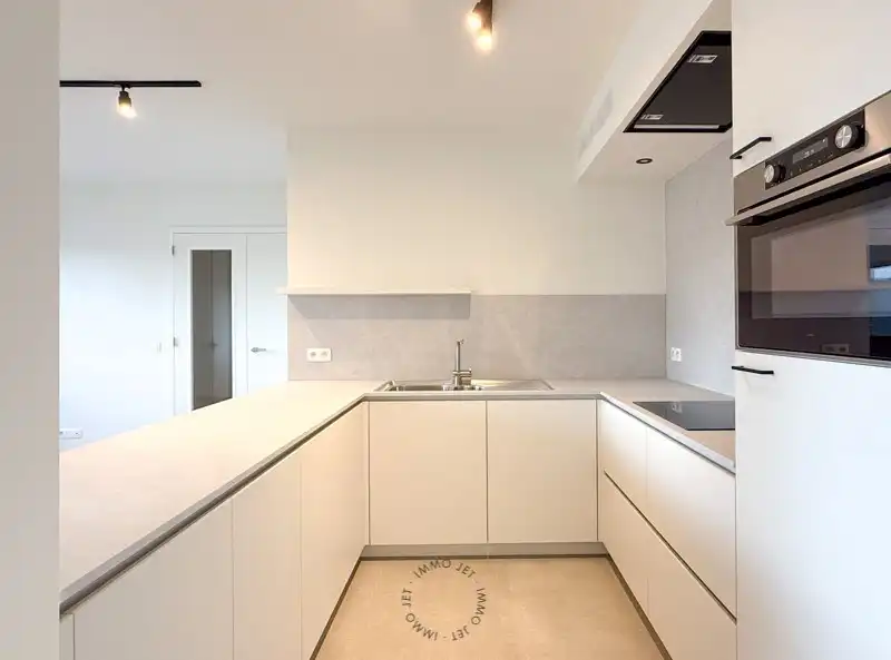 Lichtrijk nieuwbouwappartement met twee slaapkamers, terras en autostaanplaats foto 6